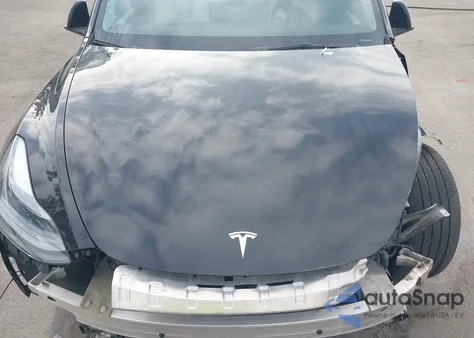 2023 Tesla Model Y from USA, damaged, VIN 7SAYGDEE9PF868233